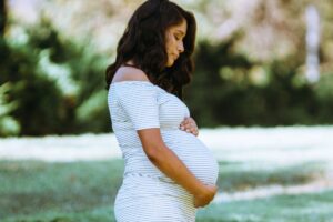 Pregnant woman outdoors