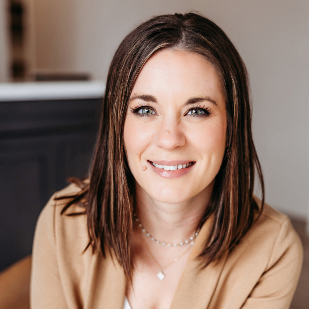 Kyrie Severson, APRN, AQH, co-founder of Transcend Headache Clinic, smiling at the West Fargo clinic.