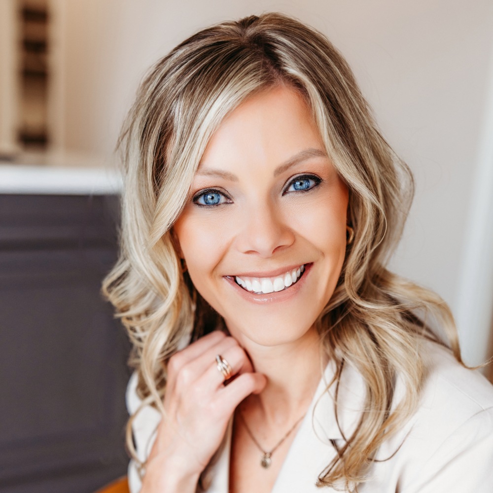 Tiffany Eslinger, APRN, co-founder of Transcend Headache Clinic, smiling at the West Fargo clinic.