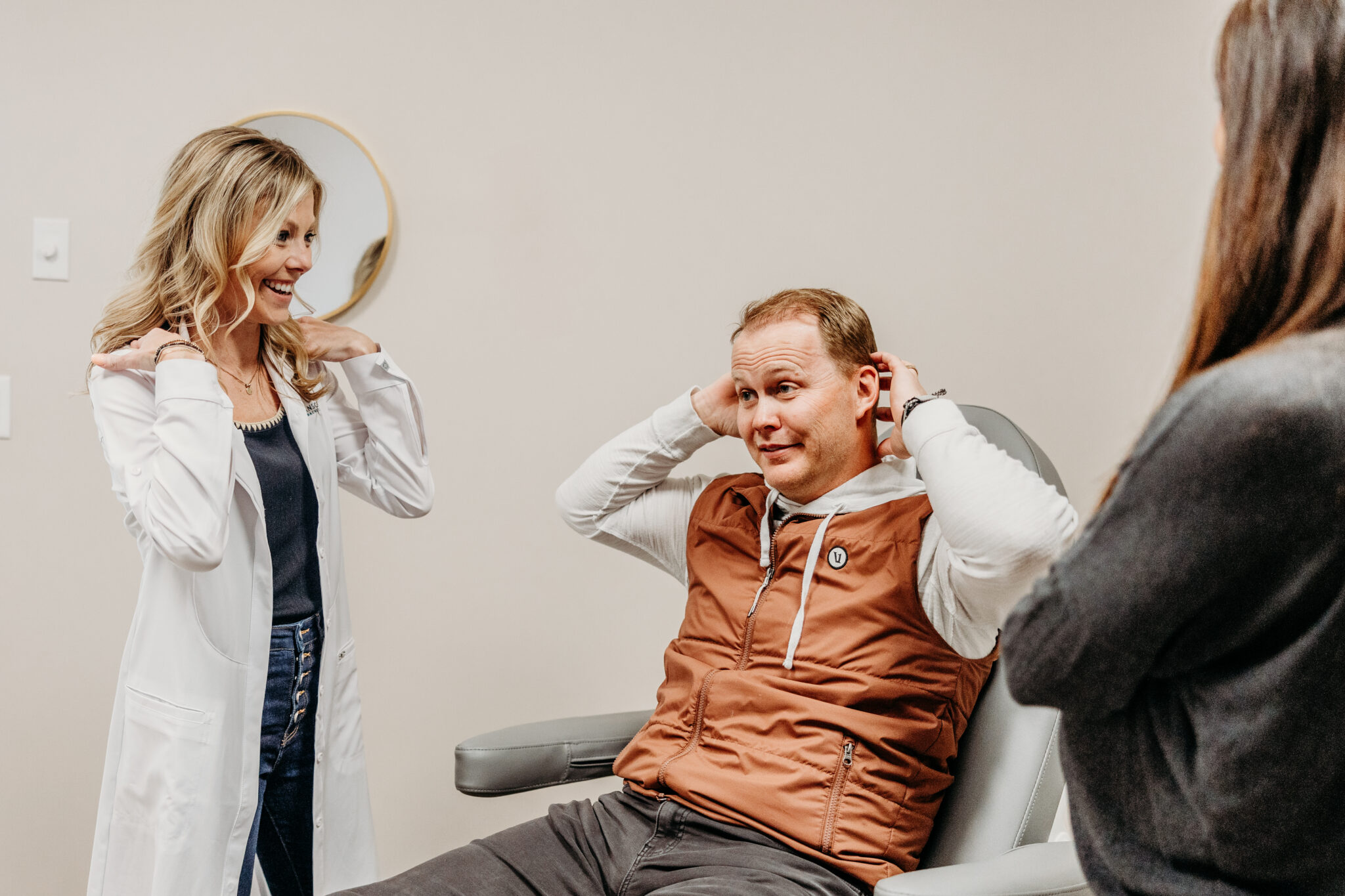 Headache specialist in West Fargo discussing symptoms with a patient to identify headache and migraine pain triggers at Transcend Headache Clinic.