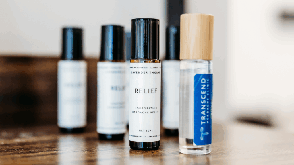 Essential oil rollers, including Transcend Headache Clinics’s “Relief” blend, for complementary headache and migraine care.
