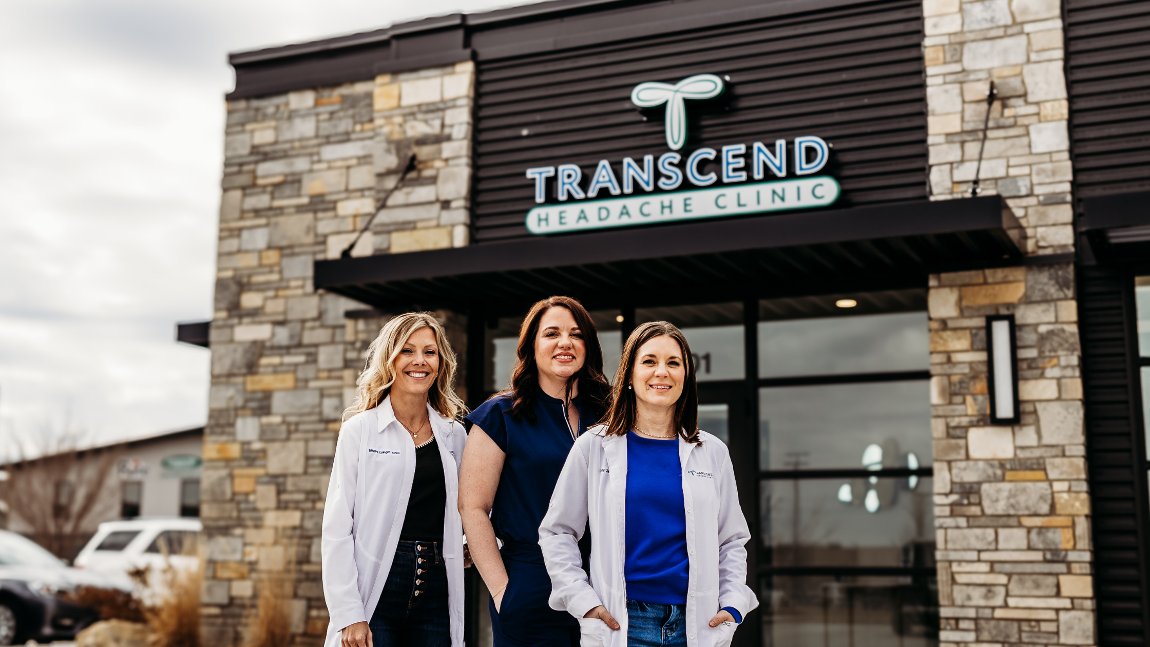 The team at Transcend Headache Clinic standing outside the clinic in West Fargo, North Dakota.
