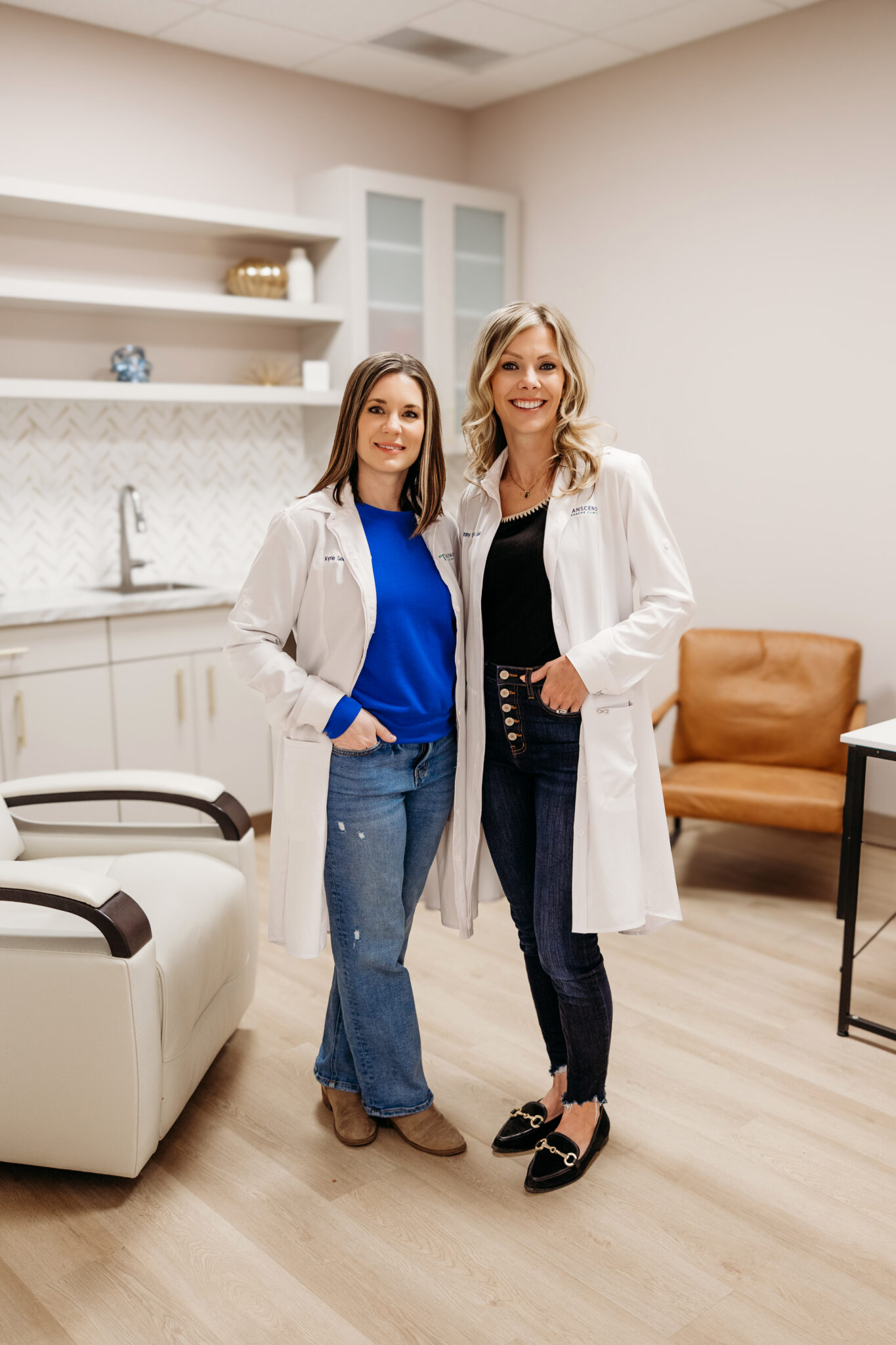 Kyrie Severson and Tiffany Eslinger, co-founders of Transcend Headache Clinic, standing together inside the clinic in West Fargo, ND.